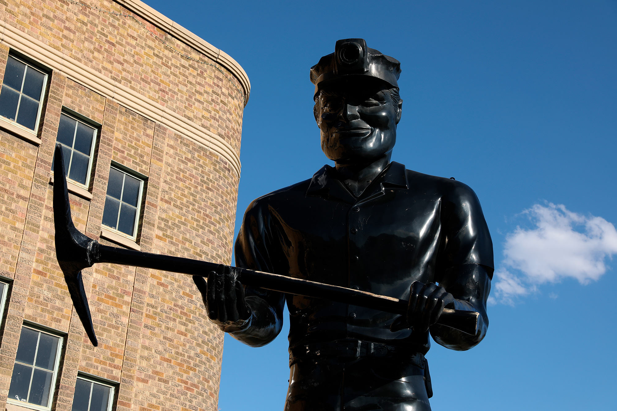 Big John Statue, Downtown Helper